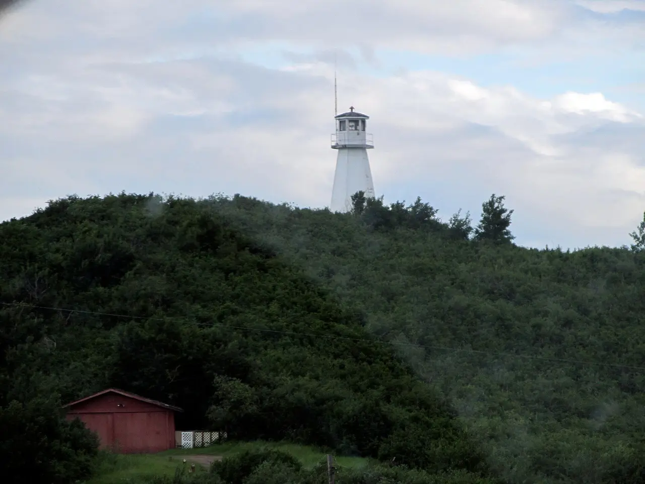 Cochin Lighthouse on a wooded hill, 2013